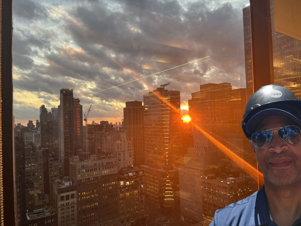 NYC skyline at sunset with Founder Juan Mojica. 
